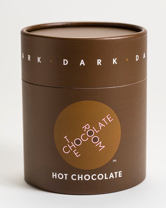 Velvety European style Dark Hot Chocolate powder in a stylish branded brown container with red top
