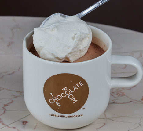 Dark hot chocolate with a dollop of fresh whip cream 